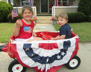 Mrs. Peterson's 2 children at the 4th of July parade.